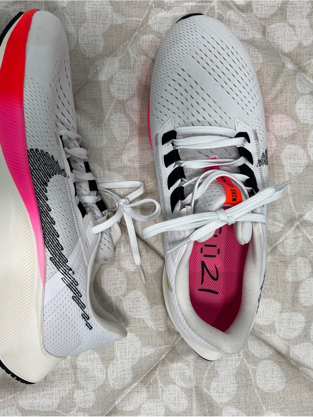 Nike Women's White Running Shoes with Pink and Black Accents